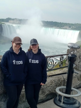 Rebecca and Jessica Gill wearing TEDS hoodies at Niagara Falls